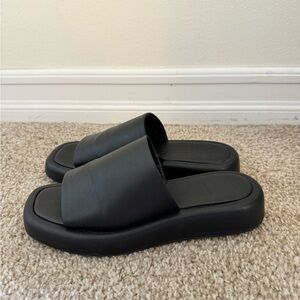 Dolce Vita black leather slides, size 8